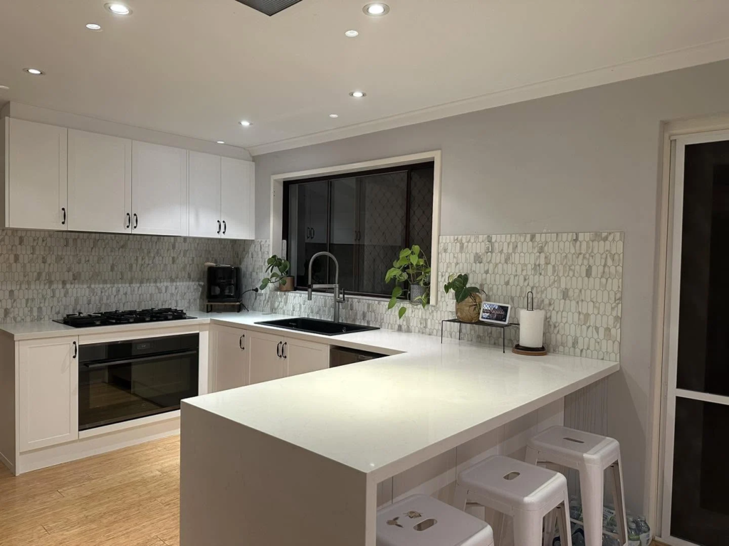 Island kitchen & tiled splashback